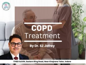 Dr. S. Z. Jafrey, Chest Specialist in Indore, offering COPD and Deficiency Treatment to an elderly patient at his clinic.