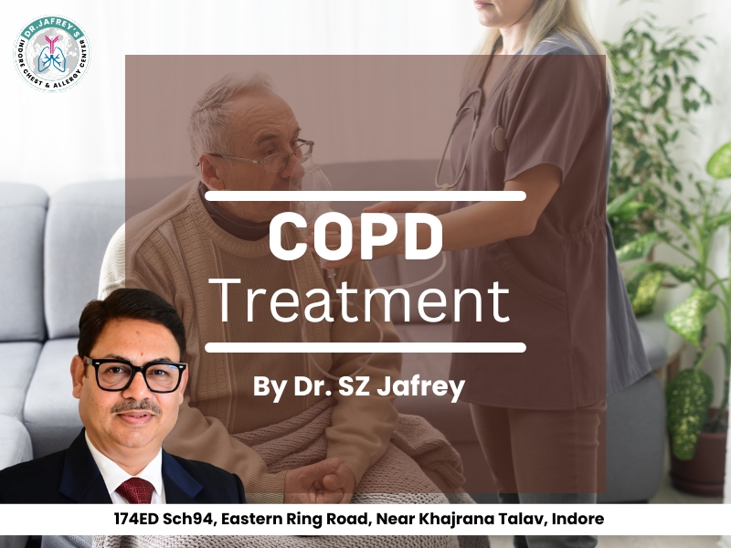 Dr. S. Z. Jafrey, Chest Specialist in Indore, offering COPD and Deficiency Treatment to an elderly patient at his clinic.